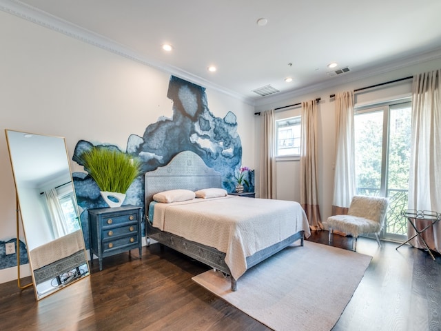 bedroom with multiple windows, wood-type flooring, and crown molding