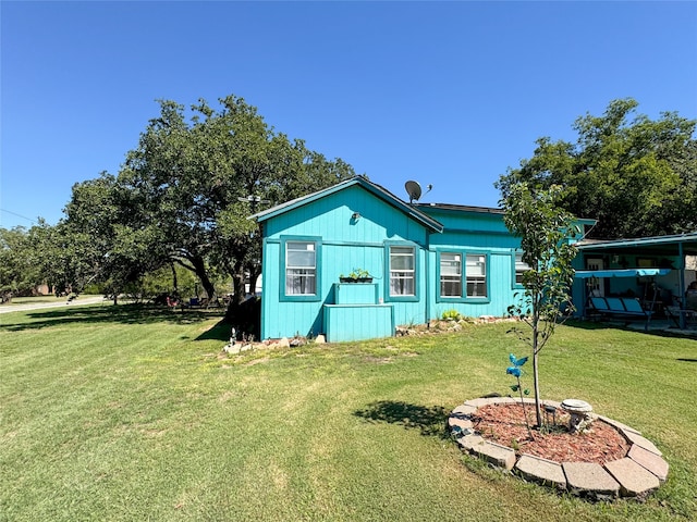 exterior space with a lawn