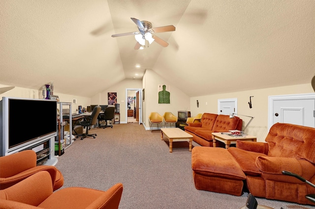 carpeted living room with vaulted ceiling, ceiling fan, and a textured ceiling