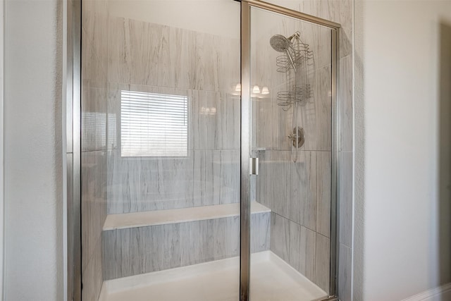 bathroom featuring walk in shower