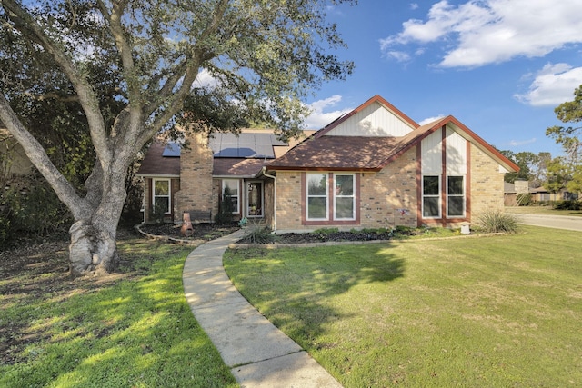 view of front of home with a front lawn