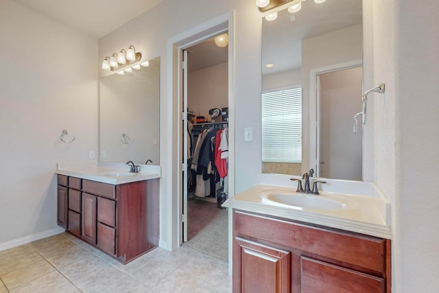 bathroom with vanity and tile patterned flooring