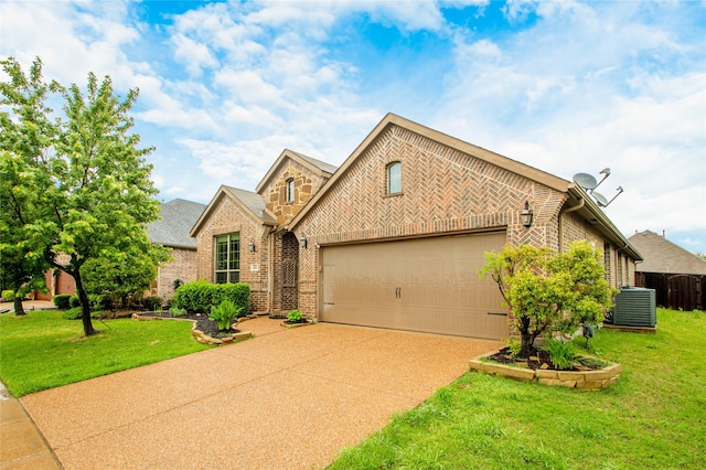 684 Cannon, Fate, TX 75087 - view of front of house with brick siding, concrete driveway, an attached garage, and central air condition unit