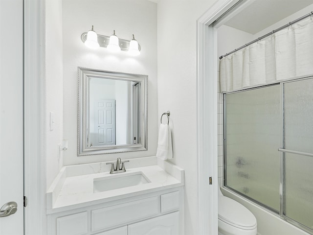 full bathroom featuring vanity, toilet, and shower / bath combination with curtain