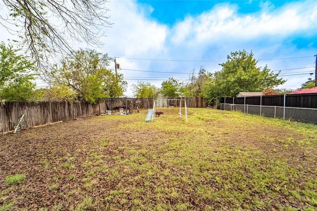 view of yard featuring a playground