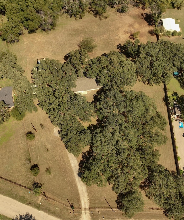 birds eye view of property with a rural view