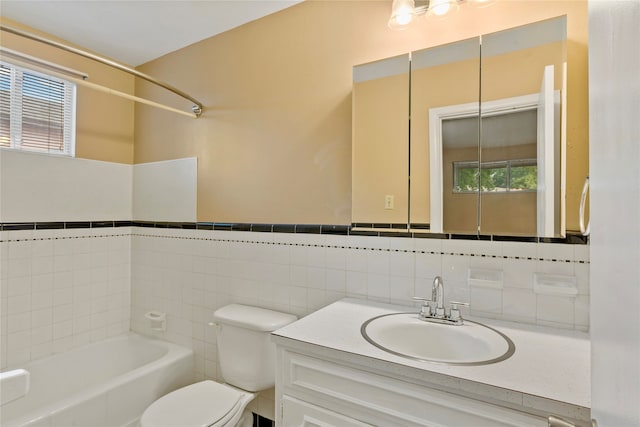 full bathroom featuring shower / bathtub combination, tile walls, vanity, and toilet