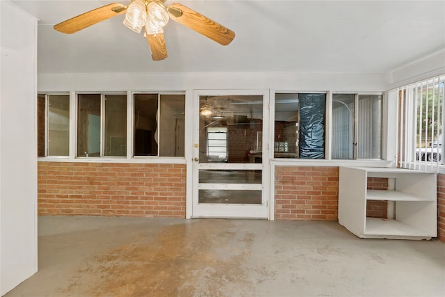 entrance to property featuring a patio area