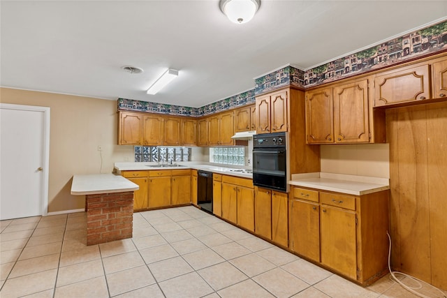 kitchen with sink, light tile patterned floors, kitchen peninsula, and black appliances