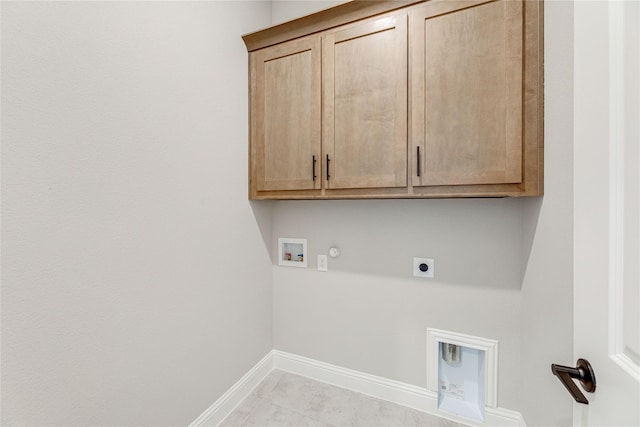 laundry room with washer hookup, gas dryer hookup, hookup for an electric dryer, and cabinets