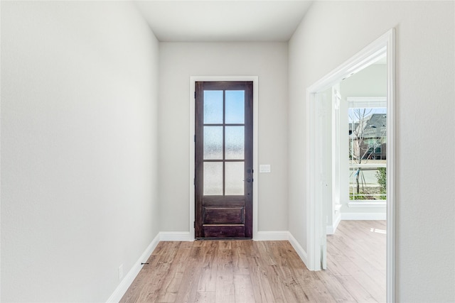 foyer with light wood-type flooring