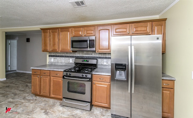 kitchen featuring crown molding, stainless steel appliances, and tasteful backsplash