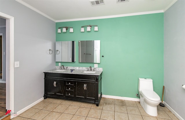 bathroom with ornamental molding, tile patterned floors, vanity, and toilet