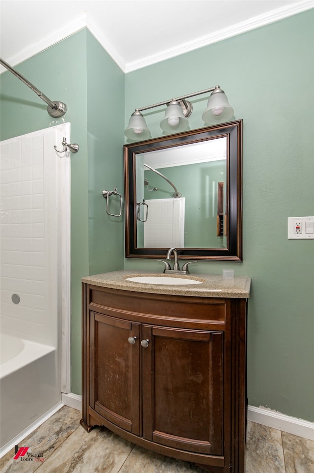 bathroom featuring vanity, bathing tub / shower combination, and ornamental molding