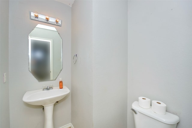 bathroom featuring toilet