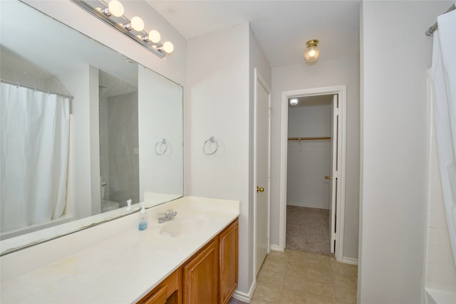 bathroom with vanity and tile patterned floors