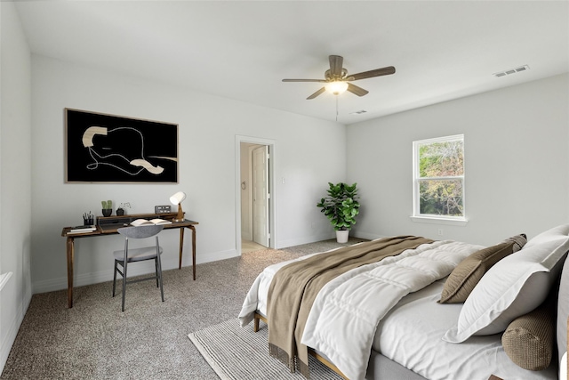 carpeted bedroom featuring visible vents, ceiling fan, and baseboards