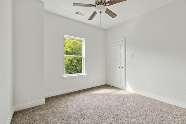 unfurnished room featuring carpet flooring and ceiling fan