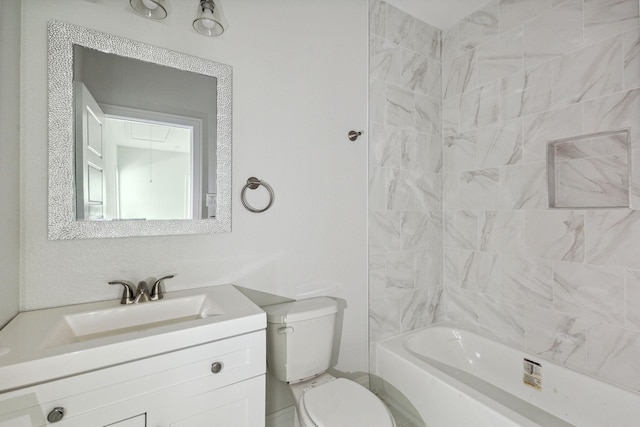 full bathroom featuring vanity, toilet, and tiled shower / bath combo