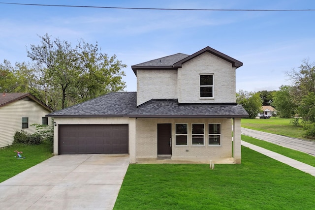 view of front of home with driveway, brick siding, and a front yard