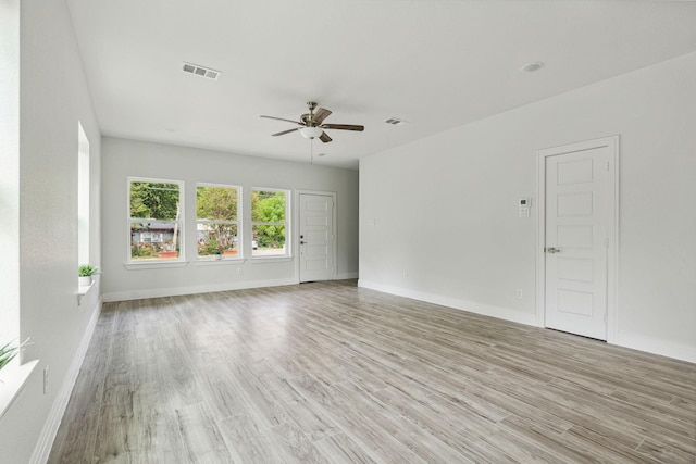 interior space featuring ceiling fan and light wood-type flooring