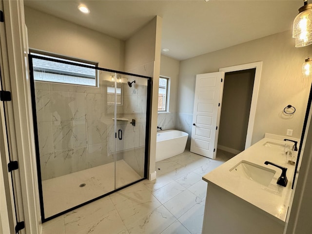 bathroom featuring plus walk in shower and vanity