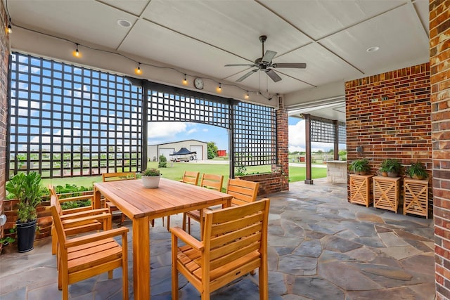 view of patio featuring ceiling fan