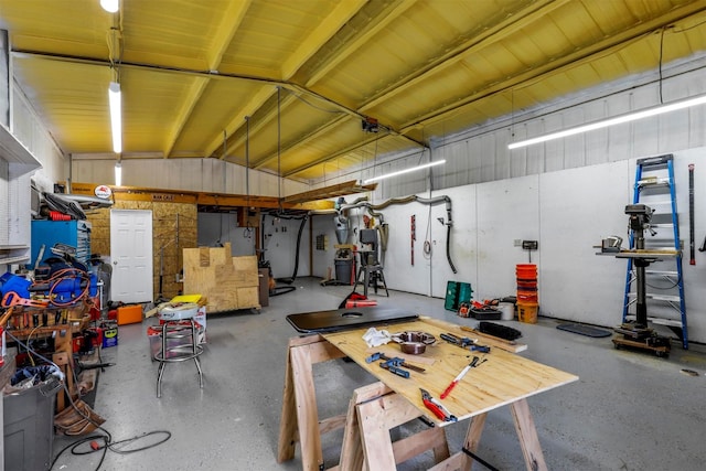 garage featuring a workshop area