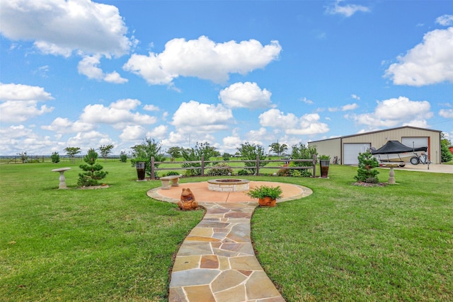 view of yard featuring a fire pit