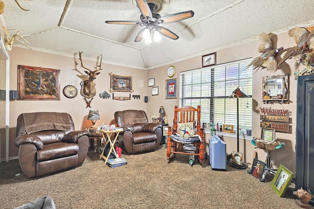 carpeted living room with ornamental molding, vaulted ceiling, ceiling fan, and a textured ceiling