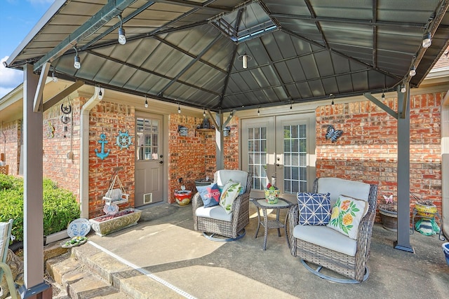 view of patio with a gazebo and french doors