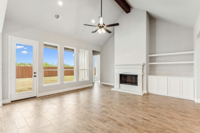 unfurnished living room featuring light hardwood / wood-style flooring, ceiling fan, beamed ceiling, and high vaulted ceiling