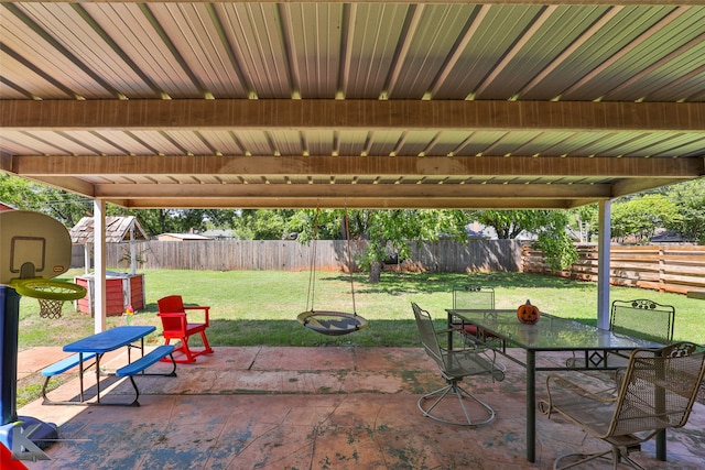 view of patio with a storage shed