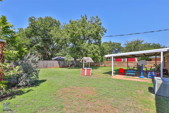 view of yard with central AC