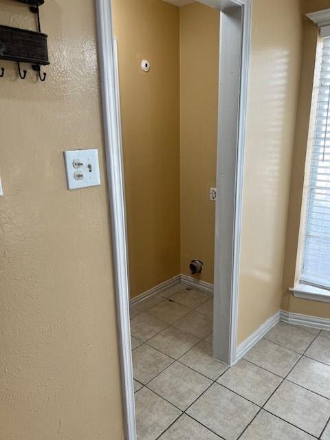 bathroom with tile patterned floors