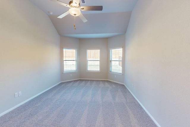 unfurnished room with ceiling fan, carpet, and lofted ceiling