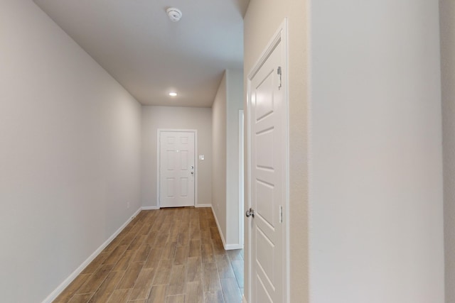 corridor featuring light hardwood / wood-style floors