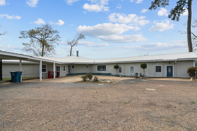 view of front of home featuring a carport