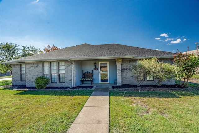 view of front of property with a front lawn