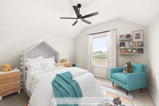 carpeted bedroom featuring ceiling fan and vaulted ceiling