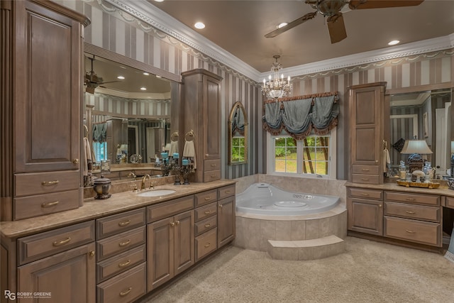 bathroom featuring a relaxing tiled tub, vanity, ceiling fan with notable chandelier, and crown molding