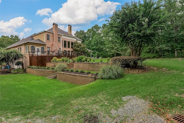 view of yard featuring a deck