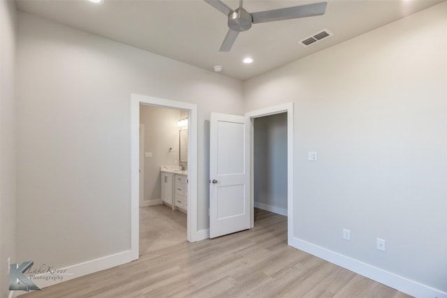 unfurnished bedroom with light wood-style floors, recessed lighting, visible vents, and baseboards