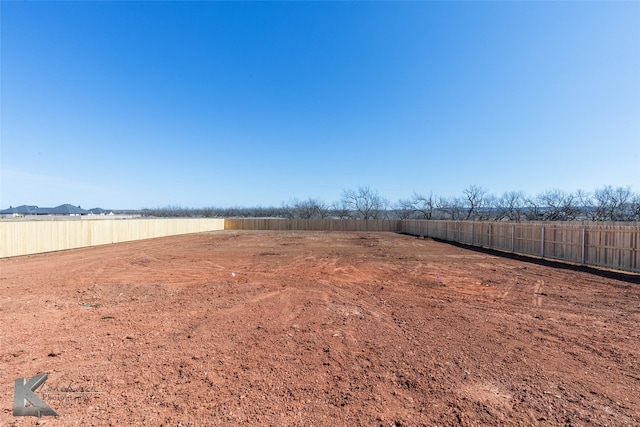 view of yard featuring fence