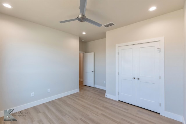 unfurnished bedroom with light wood-style floors, baseboards, visible vents, and recessed lighting