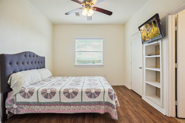 bedroom featuring ceiling fan and dark hardwood / wood-style flooring