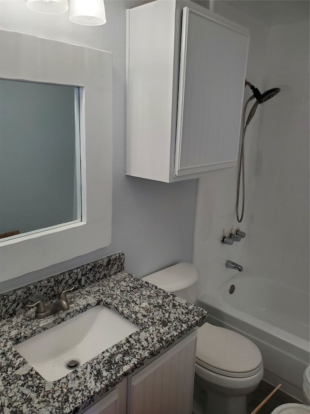 full bathroom with vanity, toilet, and shower / bathing tub combination