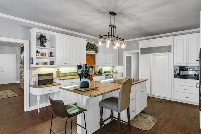 kitchen featuring hanging light fixtures, dark hardwood / wood-style floors, tasteful backsplash, and a center island