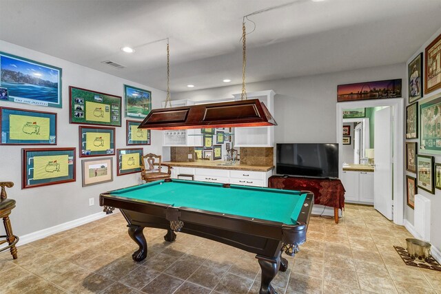 rec room featuring billiards, light tile patterned floors, and indoor bar