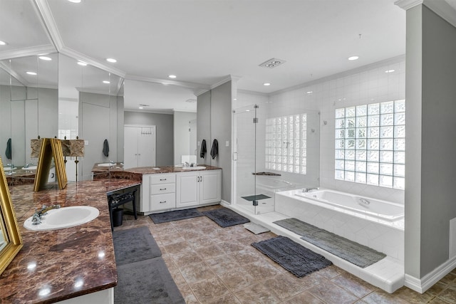 bathroom with independent shower and bath, vanity, crown molding, and tile patterned flooring